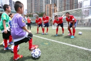 Photos 5/6:<br>
The Programmea?s ambassadors and young footballers.