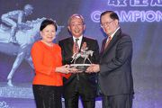Photos 10, 11: Mr Lester C H Kwok, Steward of The Hong Kong Jockey Club, presents the trophy to Dr Chang Fuk To & Maria Chang Lee Ming Shum, owners of Champion Sprinter Lucky Nine. Trainer Caspar Fownes and Mrs Alix Fownes and the connections join for a group photo after the presentation ceremony.