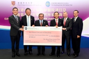 The donation of HK$1.3 billion is the Cluba?s largest ever single donation to a medical project in Hong Kong, and is also the greatest single donation ever received by CUHK.  Club Chairman T. Brian Stevenson (3rd left) presents a cheque to CUHK Council Chairman Dr Vincent Cheng (3rd right), witnessed by the Cluba?s Chief Executive Officer Winfried Engelbrecht-Bresges (2nd right) and Executive Director, Charities, Douglas So (1st left); CUHK Vice-Chancellor and President Professor Joseph Sung (2nd left) and CUHK Medical Centre Governing Board Chairman Chien Lee (1st right).