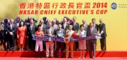 The Hon Mrs Carrie Lam Cheng Yuet-ngor, Chief Secretary for Administration of the HKSAR (front row, 2nd from right); Dr Simon S O Ip, Chairman of the Hong Kong Jockey Club (front row, 1st from right); HKJC Stewards; Club��s CEO Mr Winfried Engelbrecht-Bresges (back row, 1st from left), and connections of Golden Harvest, pose for a group photo at the HKSAR Chief Executive's Cup presentation ceremony.
