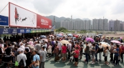 Racegoers join the National Day race meeting held at Sha Tin Racecourse.