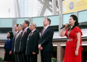Renowned Mainland soprano Jingjing Li leads the singing of the National Anthem at the opening ceremony.