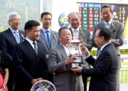 Photo 5, 6, 7:<br>
The Hon Martin Liao, Steward of the Club, presents the winning trophy and silver dishes to Owner Mr Pan Sutong, trainer Richard Gibson and jockey Douglas Whyte of Celebration Cup winner Gold-Fun.