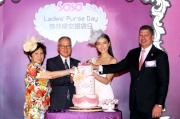 Ms Gao Yuan-yuan presents the 3D cakes specially made for the celebrations of the 10th edition of the Sa Sa Ladies�� Purse Day.