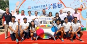 The Cluba?s Head of Charities Projects Rhoda Chan (2nd row, 4th right) joined Permanent Secretary for Home Affairs Mrs Betty Fung (2nd row, 5th right), Sports Federation and Olympic Committee of Hong Kong, China President Timothy Fok (2nd row, 5th left), Hong Kong Jockey Club Beach Festival 2014 Organising Committee Chairman Wilfred Ng (2nd row, centre), South District Chairman Chu Ching-hong (2nd row, 4th left), and several medallists  at 2014 Incheon Asian Games including Gold Medallist Lok Kwan-hoi (1st row, 2nd left) and Silver Medallist Lee Ka-man (1st row, 3rd left) from Rowing team and members of the Silver Medal winning Rugby team (1st row, 1st left and 1st to 3rd right) to officiate at the opening ceremony at Repulse Bay.