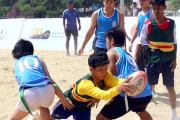 Photos 4/ 5:<br>
Local hearing-impaired students compete with Beach Rugby team from Cambodia. 
