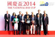 Group photo after the presentation of the National Day Cup.