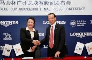 The Cluba?s Executive Director of Corporate Affairs Kim Mak (right) and Vice President of CEA Shen Lihong (left) sign a contract on the title sponsorship by the Club for the Guangzhou Final.