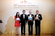 Club Chairman Dr Simon S O Ip (1st right), Swire Pacific Limited Chairman John Slosar (2nd right) and LEAPa?s Life Buddy Vivienne Tam (1st left) receive souvenirs from HKSAR Chief Executive Leung Chun-ying (2nd left) to thank them for the support to LEAP.