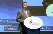 Dr Simon S O Ip, Chairman of The Hong Kong Jockey Club, delivers a welcome speech at the Gala Party.