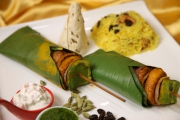 Fish Tandoori  in Banana Leaf Served with Yellow Rice 