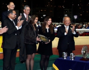 Photos 3,4,5,6:<br> The Hon Sir CK Chow, Steward of the HKJC (right in Photo 3), presents the Happy Valley Trophy and a silver dish to representatives of Domineer’s Owner Fashion Syndicate, and souvenirs to representative of Trainer Caspar Fownes and Jockey Zac Purton. 