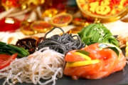 Tossed Assorted Noodles with Salmon, Kimchi, Dried Fish, Egg, Cucumber, Tomato, Bell Pepper and Korean Chilli Paste 