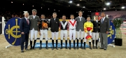 「香港賽馬會130週年 - 騎師馬術混合賽」舉行前，馬會主席葉錫安博士 (右一) 及馬會行政總裁應家柏先生(左一)與各參賽選手合照。