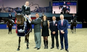 Photos 6, 7: Swiss rider Martin Fuchs claims the Hong Kong Jockey Club Trophy, another highlight of the day. Club Chairman Dr Simon Ip (2nd left); Club Steward and President of Hong Kong Equestrian Federation Michael Lee (2nd right); and Club Chief Executive Officer Winfried Engelbrecht-Bresges (right) present the trophy to the champion rider.