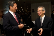 Club Chairman Dr Simon S O Ip (left) and Convenor of the Non-Official Members of the Executive Council The Hon Lam Woon-kwong (right).