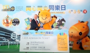 A mascot from the a?Riding High Together Teama?, presents an admission ticket to the Festival to Club CEO Winfried Engelbrecht-Bresges welcoming him to the event. The ten mascots in the a?Riding High Together Teama? represent the Cluba?s ten areas of charitable contribution.