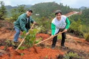 Photo 4, 5:<br>
The Cluba?s Green Ambassadors plant trees to mark the second phase of the HKJC Forest. 