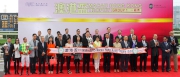 Dr Simon S O Ip, Chairman of The Hong Kong Jockey Club (front row, eighth from right), Ms Angela Leong, Vice Chairman & Executive Director of Macau Jockey Club (front row, ninth from right), Stewards and senior officials of the HKJC and MJC, and the connections of Macau Hong Kong Trophy winner Gurus Dream, smile for the cameras at the Macau Hong Kong Trophy presentation ceremony.