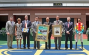 From right: Jockey Douglas Whyte, Club CEO Mr Winfried Engelbrecht-Bresges, Club Chairman Dr Simon Ip, Ambitious Dragon��s Owners Mr Johnson Lam Pui Hung and Mr Anderson Lam Hin Yue, trainer Tony Millard, Mrs Millard and the Club��s Executive Director of Racing, William A Nader, pose for a group photo at Ambitious Dragon��s farewell ceremony.