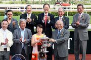 Photo  5, 6, 7: At the trophy presentation ceremony, Club Steward The Hon Sir C K Chow presents the Sprint Cup trophy and silver dishes to Dundonnell��s Owner Elizabeth Lee Ho Ling, trainer Richard Gibson and jockey Stephane Pasquier.