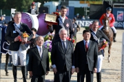 Members of The Hong Kong Jockey Club Equestrian Team Patrick Lam (middle of back row) places first in the second leg of the FEI World Cup Jumping China League in Beijing today (3 May).