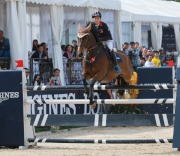 Member of HKJC Equestrian Team, Raena Leung, places fourth with four faults. 