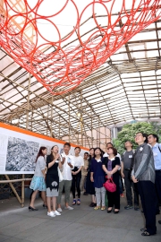 Photos 3 /4 /5:<br
The Club's Head of Charities Projects Rhoda Chan and officiating guests tour a huge bamboo scaffold exhibition at Morse Park.