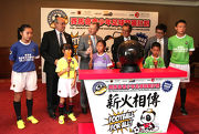 The Cluba?s Chief Executive Officer Winfried Engelbrecht-Bresges (back row 3rd left) joined with HKFA Chairman Brian Leung (back row 3rd right); Chief Executive Officer Mark Sutcliffe (back 2nd left); LCSD Assistant Director (Leisure Services) Richard Wong (back row 2nd right) and young footballers at the press conference of this yeara?s Jockey Club Youth Football Development Programme aᡧ Summer Scheme.