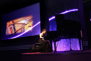 Ms Colleen Lee, the Hong Kong Jockey Club Scholarship awardee, puts on a piano performance. 