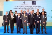 Club Chairman Dr Simon S O Ip (first row, centre); the Cluba?s Chief Executive Officer Winfried Engelbrecht-Bresges (back row, centre); Executive Director, Charities and Community, Leong Cheung (back row, 3rd right); Vice-Chancellor of the University of Oxford Professor Andrew Hamilton (first row, 3rd right) and representatives from higher education institutions. 