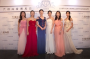 Photos 1, 2 :<br>
Renowned actresses Charmaine Sheh(3rd from right), Rebecca Chu(3rd from left), the Miss Hong Kong Pageant 2015 Title Winners Louisa Mak (Champion - 2nd from left), Ada Pong (First runner-up �V 1st from left), Karmen Kwok (Second runner-up �V 2nd from right) and Iris Lam (Winner of Miss Friendship - 1st from right)(Photo 1); renowned actor Raymond Lam, spokesperson of Love Forever collection(Photo 2) pose for photos outside the Jockey Club Box.  