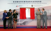 Club Deputy Chairman Anthony W K Chow (2nd right) joins Chief Executive Officer Winfried Engelbrecht-Bresges (1st right), Permanent Secretary for Home Affairs Betty Fung (3rd left), HKSI Chairman Carlson Tong (2nd left) and Chief Executive Dr Trisha Leahy (1st left) in unveiling a plaque to mark the opening of the Jockey Club Sports Building.