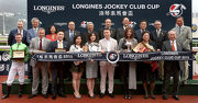HKJC Chairman Dr Simon Ip (back row, first from right); HKJC Stewards; Chief Executive Officer Winfried Engelbrecht-Bresges (back row, first from left); Karen Au Yeung, Vice President of LONGINES HK and connections of LONGINES Jockey Club Cup winner Military Attack pose for a group photo at the presentation ceremony.