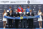 The Cluba?s Deputy Chairman Anthony W K Chow (3rd left at front) and Steward Silas Yang Siu Shun (3rd right at front) present prizes to the winners at The Hong Kong Jockey Club Champion Competition.
