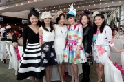 Ladies and gentlemen don their finest attire to attend Sa Sa Ladies�� Purse Day at Sha Tin Racecourse.