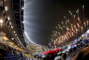 Photo 4, 5<br>
A pyrotechnics display on the turf light up the Happy Valley sky during the opening ceremony.