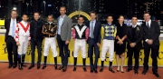 Leading equestrians taking part in the HKJC Race of the Riders paid a visit to Happy Valley Racecourse tonight (17 February) to meet their partner jockeys. The four equestrians - Simon Delestre (3rd left), Marco Kutscher (5th left), Bertram Allen (5th right) and Jacqueline Lai (3rd right) - posed for a photo with their partner jockeys Vincent Ho (2nd left), Joao Moreira (4th left), Neil Callan (6th left) and Derek Leung (4th right). Joining them were Club Steward and President of Hong Kong Equestrian Federation Michael Lee (2nd right), Club Executive Director of Racing Authority Andrew Harding (1st left) and with Managing Director of EEM Fabien Grobon (1st right).