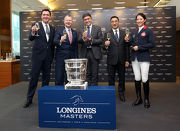 Club Steward and President of Hong Kong Equestrian Federation Michael Lee (2nd right), Club Chief Executive Officer Winfried Engelbrecht Bresges (2nd left) and member of HKJC Equestrian Team Jacqueline Lai (1st right) pose for a picture together with Managing Director of EEM Fabien Grobon (1st left) and Vice-President and Head of International Marketing of Longines Juan-Carlos Capelli (middle). 