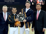 Club Chairman Dr Simon Ip (first right) and Club Chief Executive Officer Winfried Engelbrecht-Bresges (first left) present the prize to the winners of the HKJC Race of the Riders, including jockey Joao Moreira (second left) and German rider Daniel Deusser (second right).