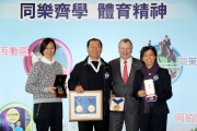 Olympic windsurfing gold medalist Lee Lai-shan (1st left), Paralympic wheelchair fencing gold medalist Benny Cheung Wai-leung (2nd left) and Olympic bronze medalist in mixed doubles badminton Amy Chan, who is now Headmistress of the Hong Kong Jockey Club Apprentice Jockeysa? School (1st right), hand their medals to the Cluba?s Chief Executive Officer Winfried Engelbrecht-Bresges (2nd right) for display at the Festival.