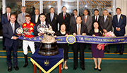 Club Chairman Dr Simon S O Ip, Club Stewards, CEO Winfried Engelbrecht-Bresges and connections of the Queen Mother Memorial Cup winner Ambitious Champion smile for photo at the trophy presentation ceremony.