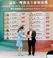 Mr Anthony Kelly, Executive Director, Racing Business and Operations of the HKJC, unveils the first drawn runner Aerovelocity at the Chairman��s Sprint Prize barrier draw ceremony at Sha Tin Racecourse this morning. 
