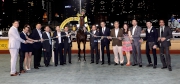 Happy connections of Jun Huo celebrate their runner��s victory in the winners�� circle.