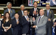 Photos 3, 4, 5<br>
Mr Michael Ramsden, Director of  Victoria Racing Club, and Mrs Michael Ramsden present the Victoria Racing Club Trophy and souvenirs to representative of winning owner, trainer Francis Lui and jockey Douglas Whyte.