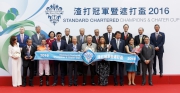 Club Chairman Dr Simon Ip (back row, 1st from right), HKJC Stewards, CEO Winfried Engelbrecht-Bresges (back row, 1st from left), senior executives of Standard Chartered and winning connections of Blazing Speed, smile for cameras at the Standard Chartered Champions & Chater Cup trophy presentation ceremony.