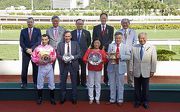 HKJC Stewards, Club��s Chief Executive Officer and connections of Premier Cup winner Sun Jewellery, smile for cameras at the presentation ceremony.