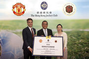 The Club��s Executive Director, Corporate Planning, Communications and Membership Scarlette Leung (right), MU Managing Director, Asia Pacific Jamie Reigle (left) and HKFA Chairman Brian Leung (centre) invite the public to support and attend the JC Youth Football Academy Summit games. 