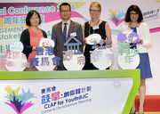 The Cluba?s Executive Director, Charities and Community, Leong Cheung (2nd left) presents souvenirs to keynote speakers of the Conference. 