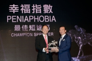 Mr Philip N L Chen, Steward of The Hong Kong Jockey Club, presents the trophy to Huang Kai Wen, owner of Champion Sprinter Peniaphobia.
